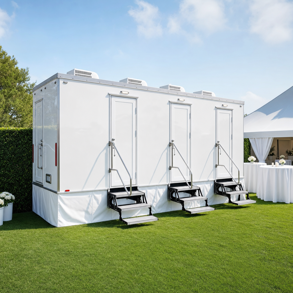Restroom trailer set up and leveled at an outdoor event venue